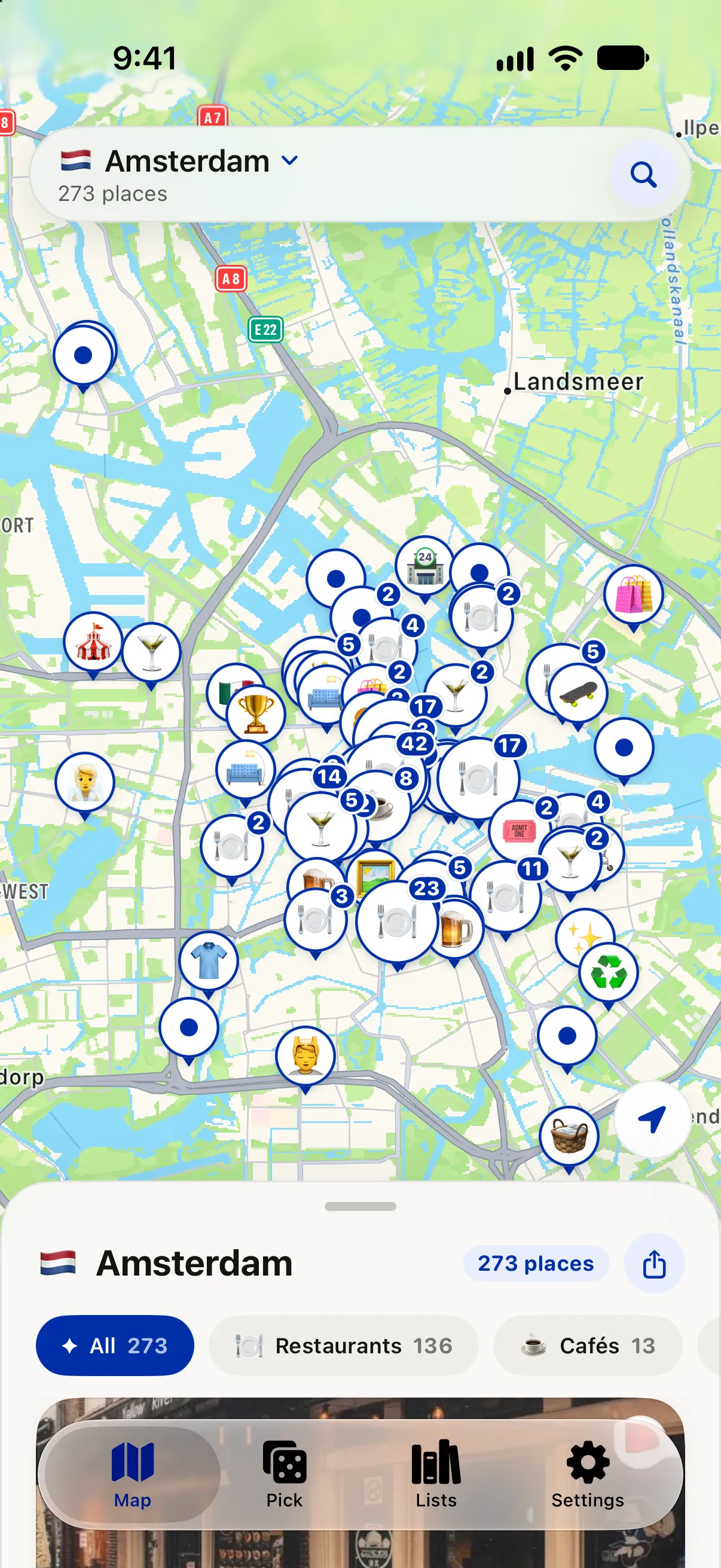 The whole Amsterdam list on the map. Each place is a pin with an emoji for its kind, such as a fork for a restaurant or a glass for a bar. Below the map are filters: All 273, Restaurants 136, Cafés 13.